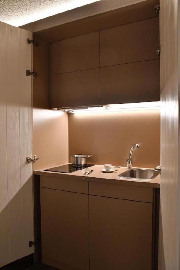 Aparthotel Al Palazzetto Udine Esterno foto